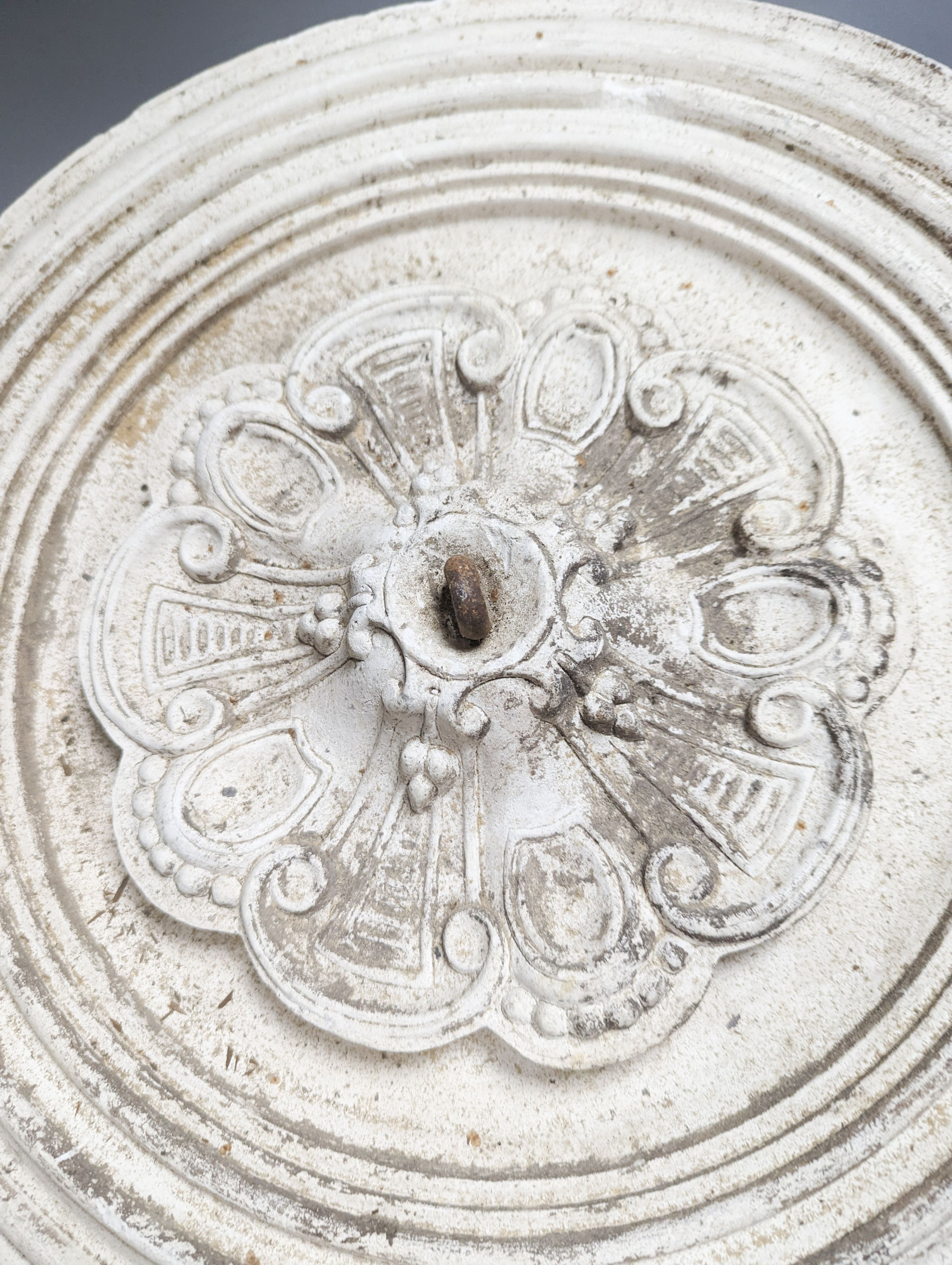 A contemporary chrome and glass electrolier with ceiling rose